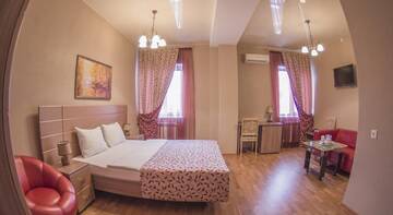 Двухместный номер бизнес-класса с 1 кроватью в Гостинице Уют